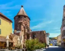 Historic medieval tower in a charming German town square.